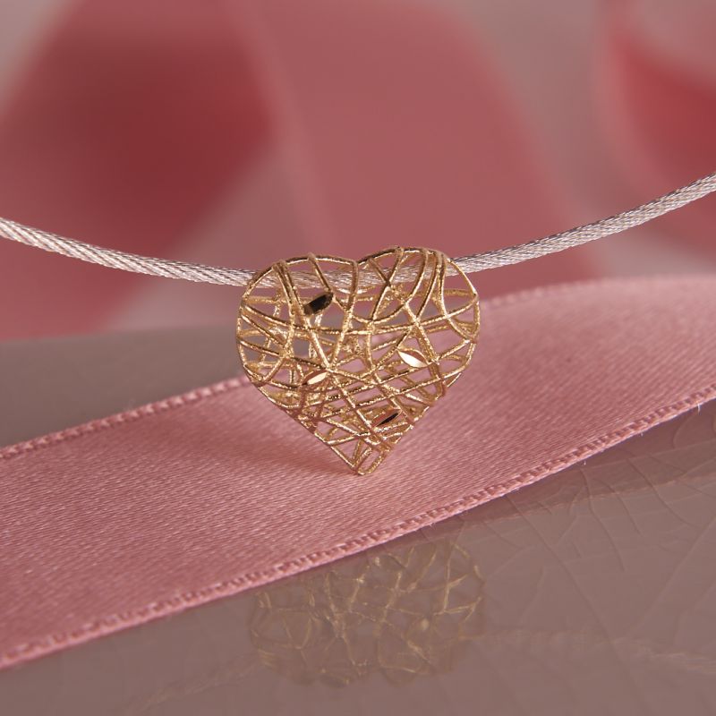 Silber Collier mit Herz aus 18 Karat Gelbgold geflochten